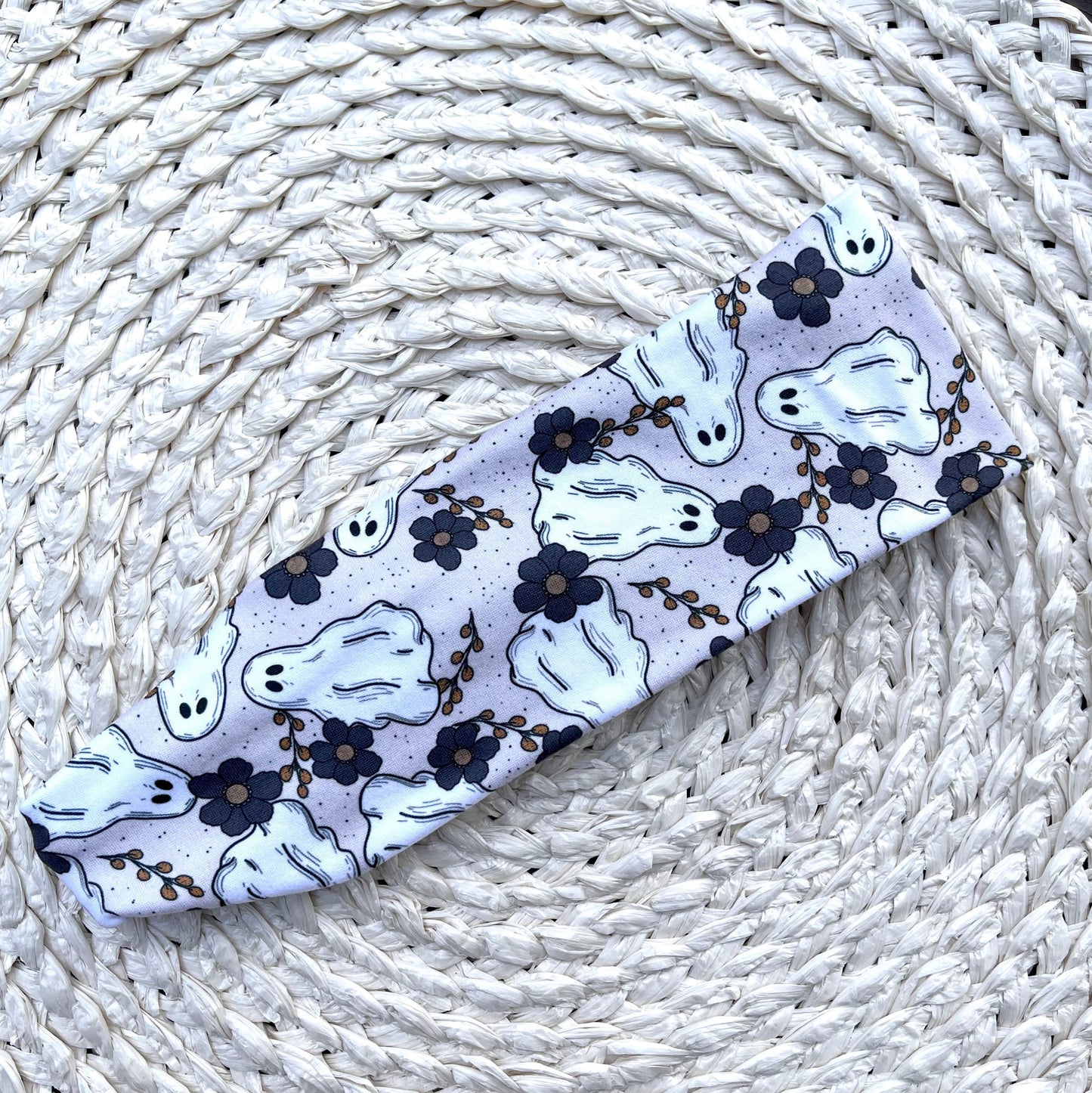 tan headband with gray flowers and ghost print