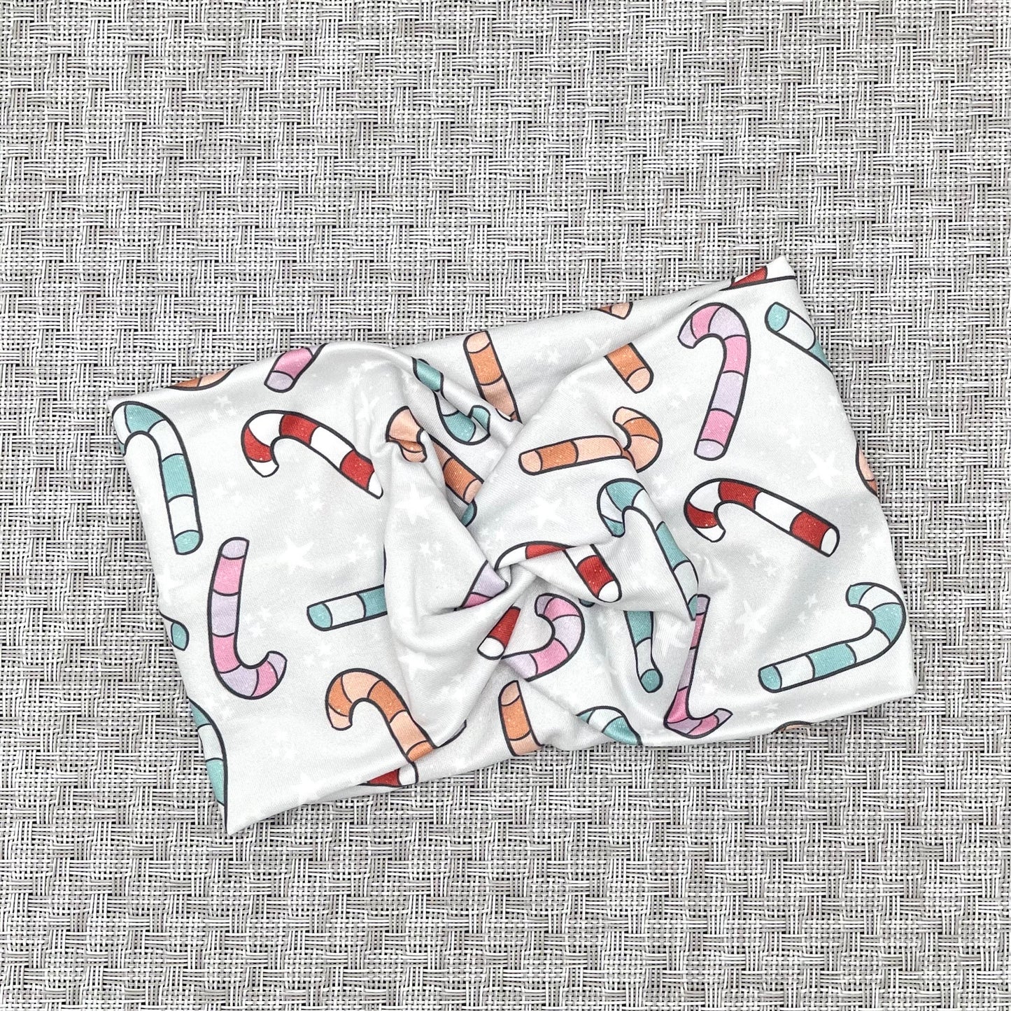 gray headband with candy canes