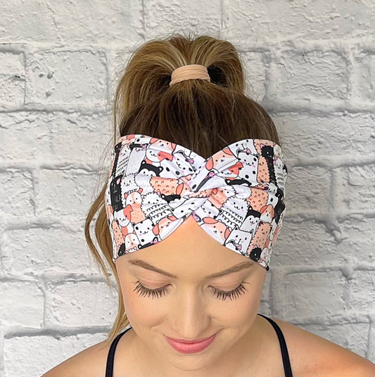 white, black, and peach headband with cats and dogs