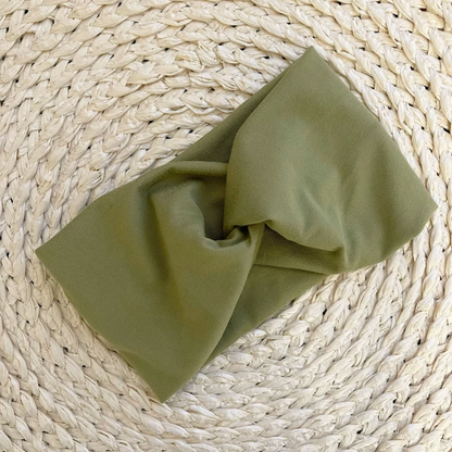 Wide, twisted, sage green color headband.