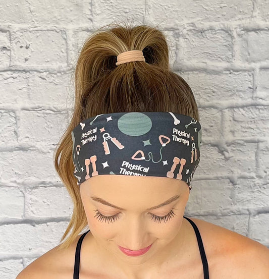 black headband with print "physical therapy" and physical exercise and therapy related items