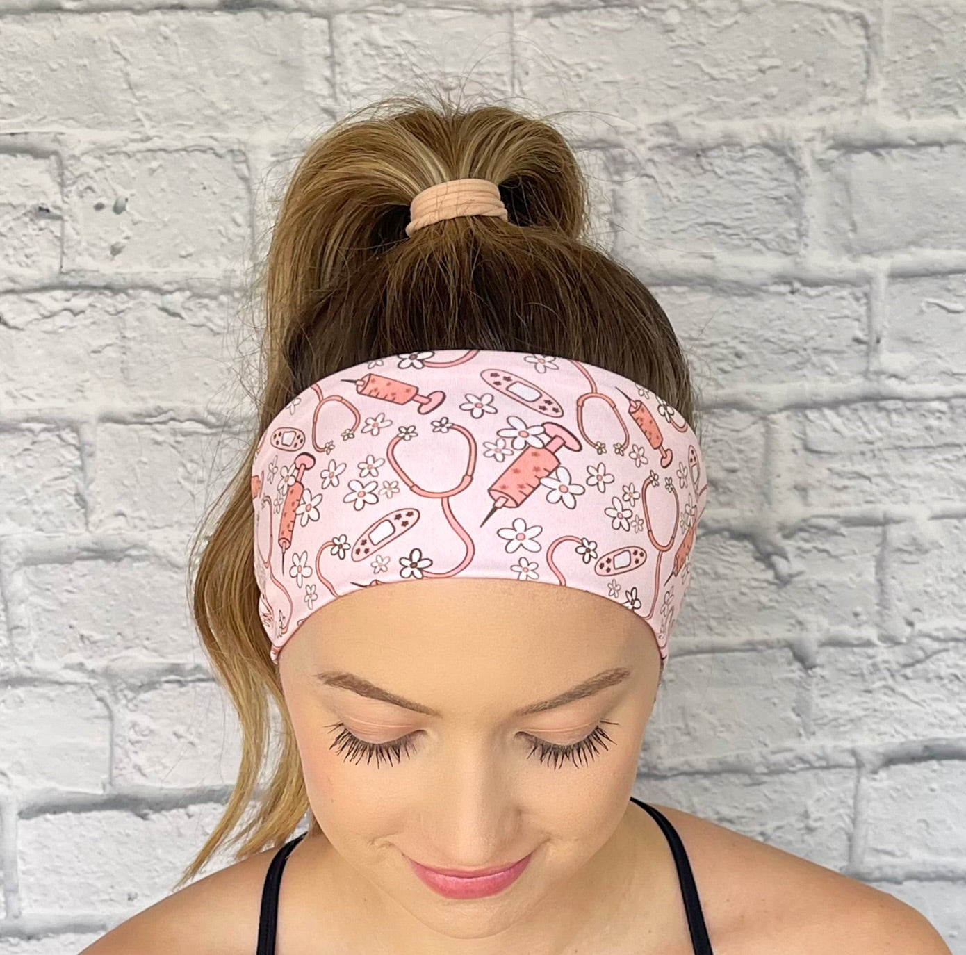 pink headband with medical theme print and flowers