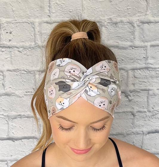 light green headband with cats and paw prints