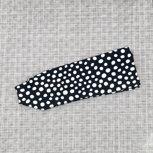 black headband with white spotted print