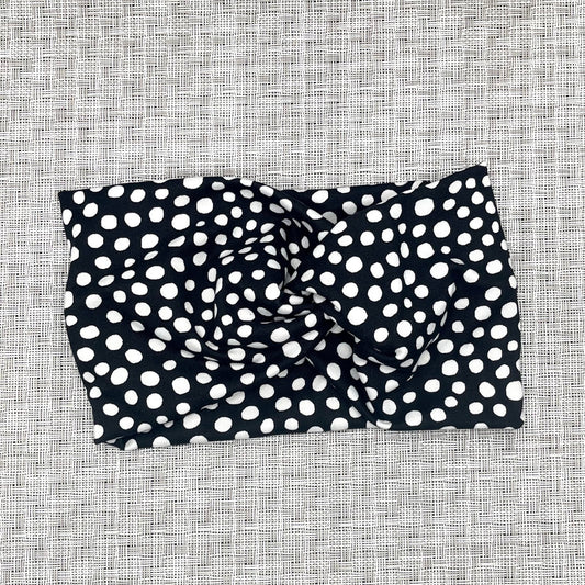 black polka dot headband in wide twisted style