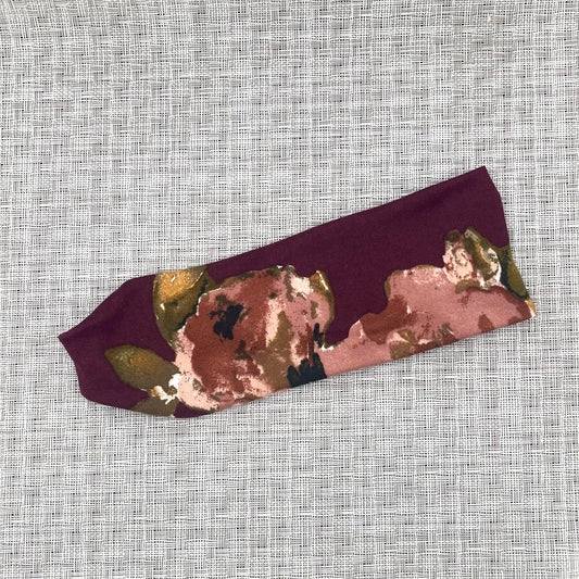 burgundy color headband with pink, brown, yellow, and white floral print