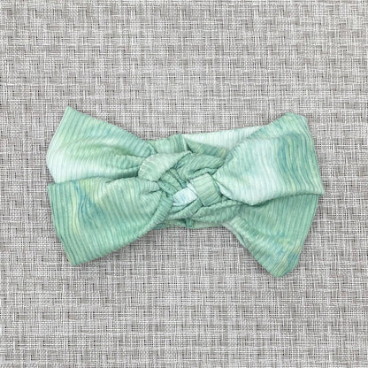 Mint green, ribbed, tie dye sailor knot headband.