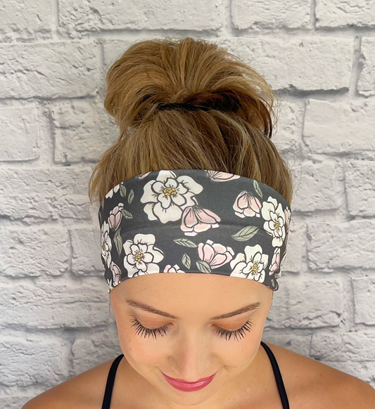 dark green headband with white flowers