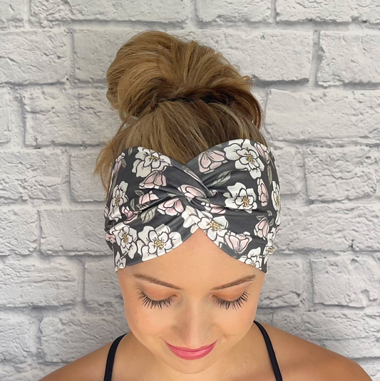 dark green headband with white flowers