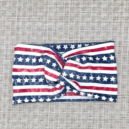 White wide twist headband with American Flag theme print