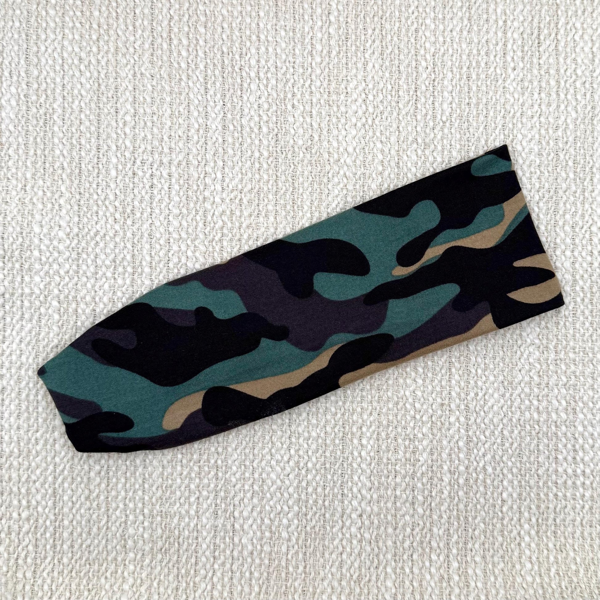 Flat, stretchy headband with camo print.
