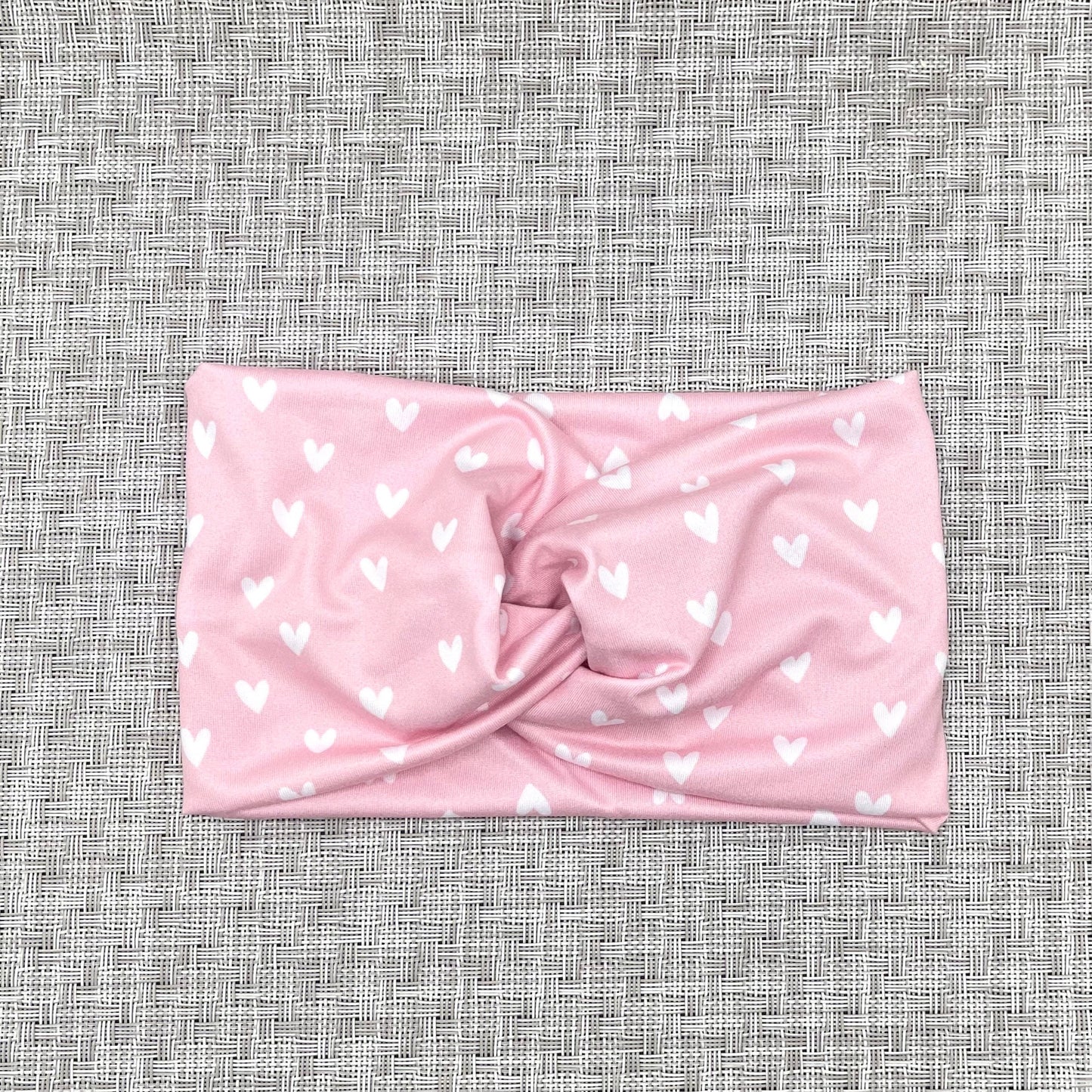 pink wide twist headband with white hearts