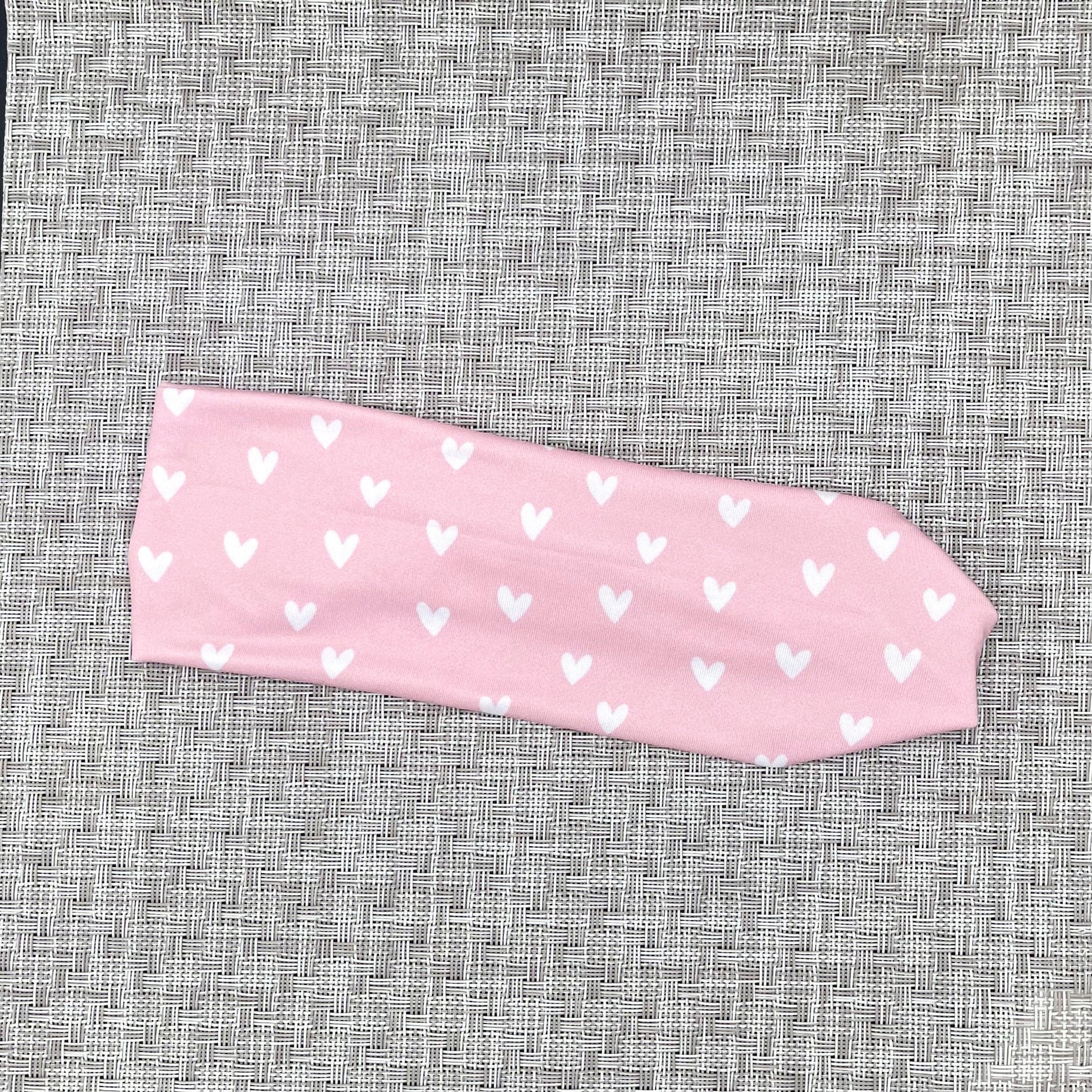 light pink headband with white hearts