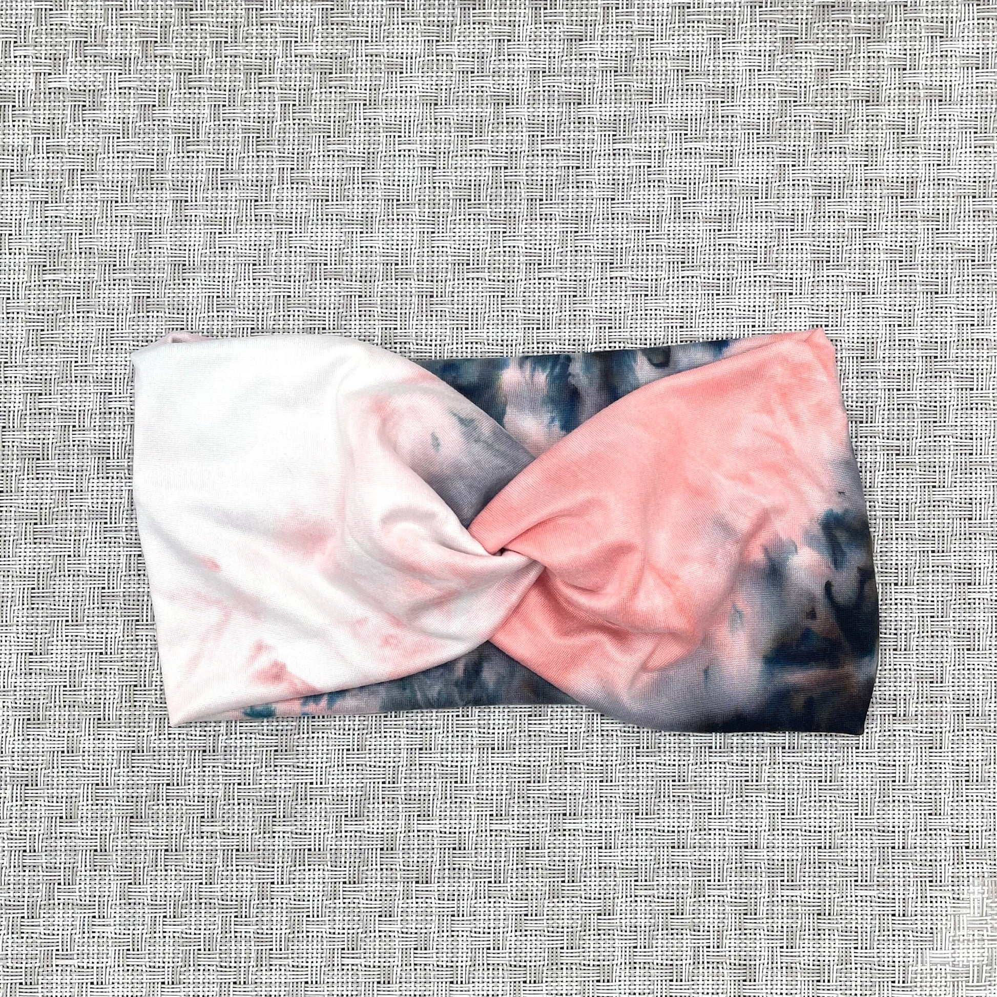 pink, white, gray, and black tie dye headband in wide twist style