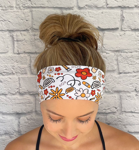 white headband with red and yellow flowers and medical theme print