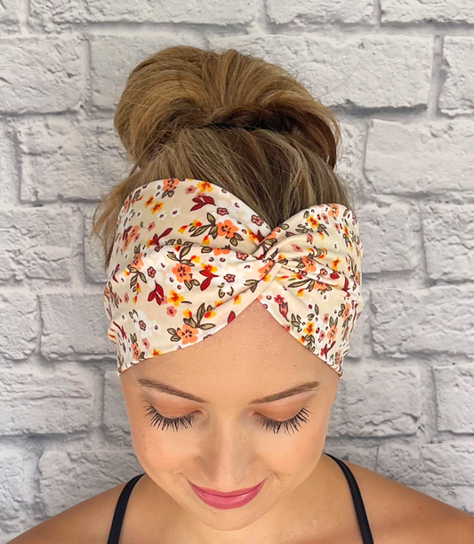 cream color headband with small flowers