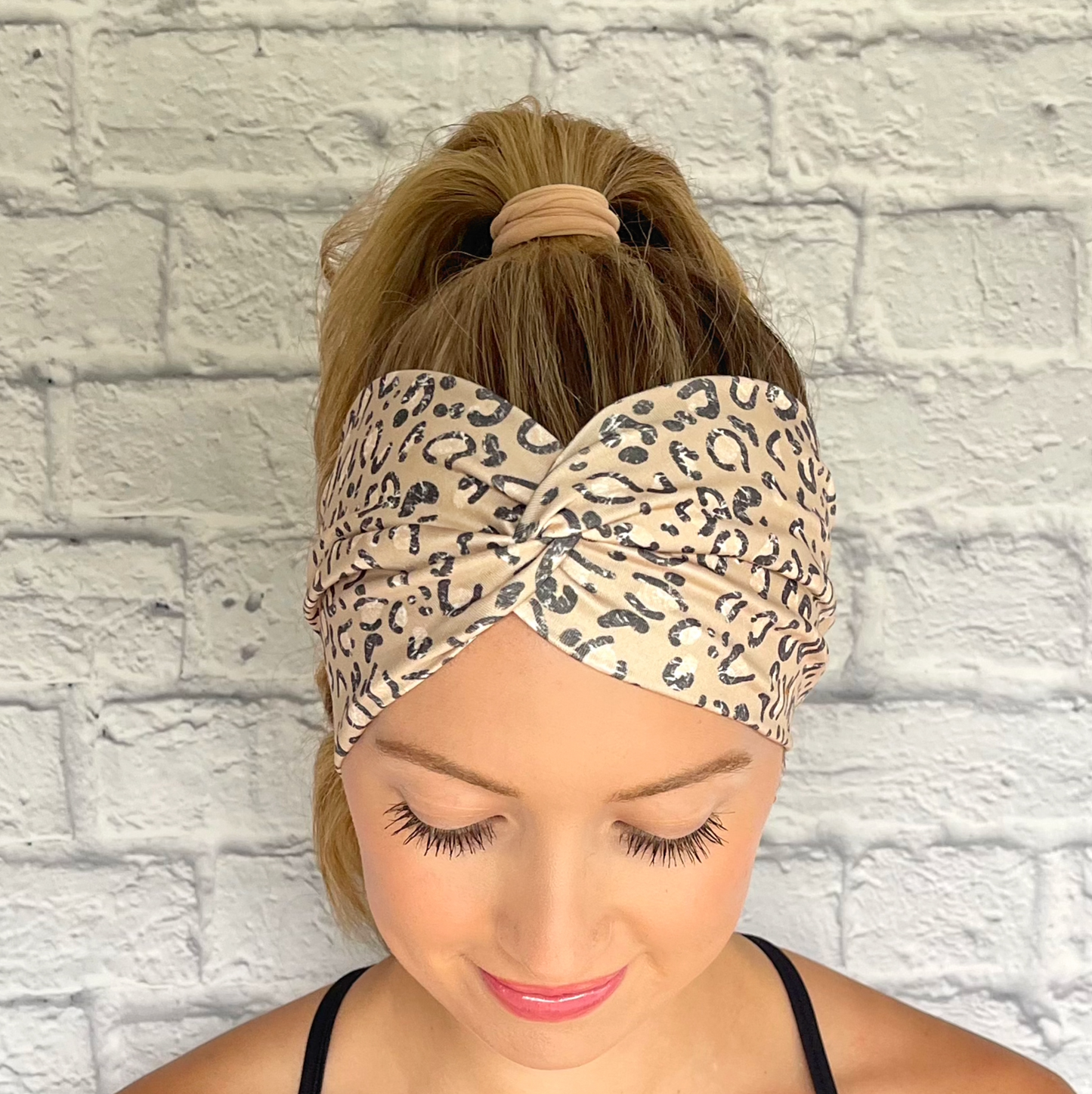 tan headband with black cheetah print