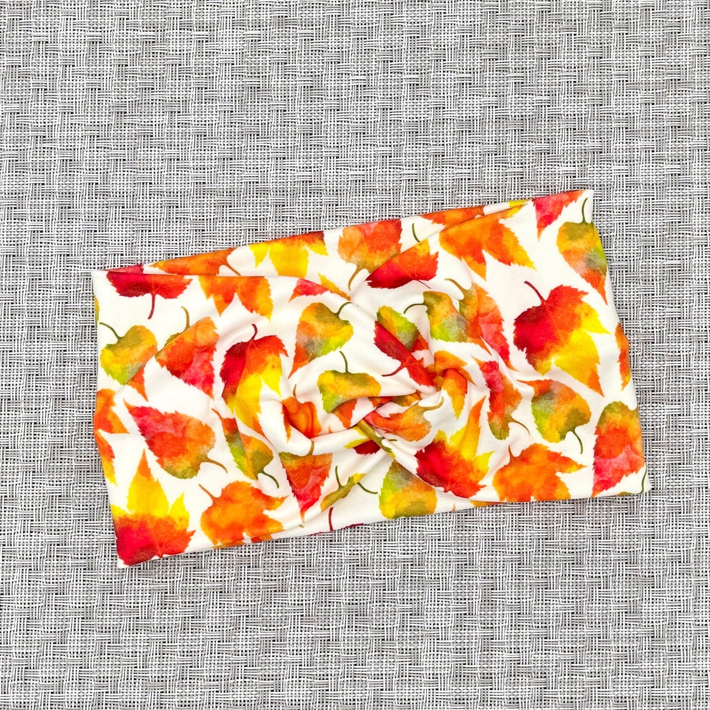 white headband with fall color leaves