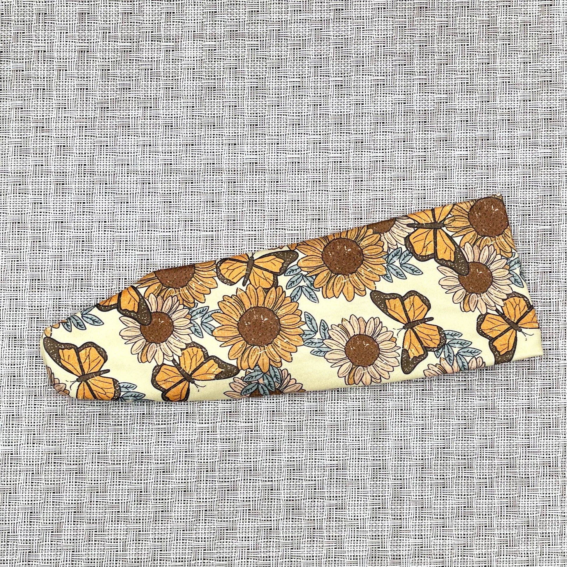 yelllow/tan headband with sunflowers and monarch butterflies