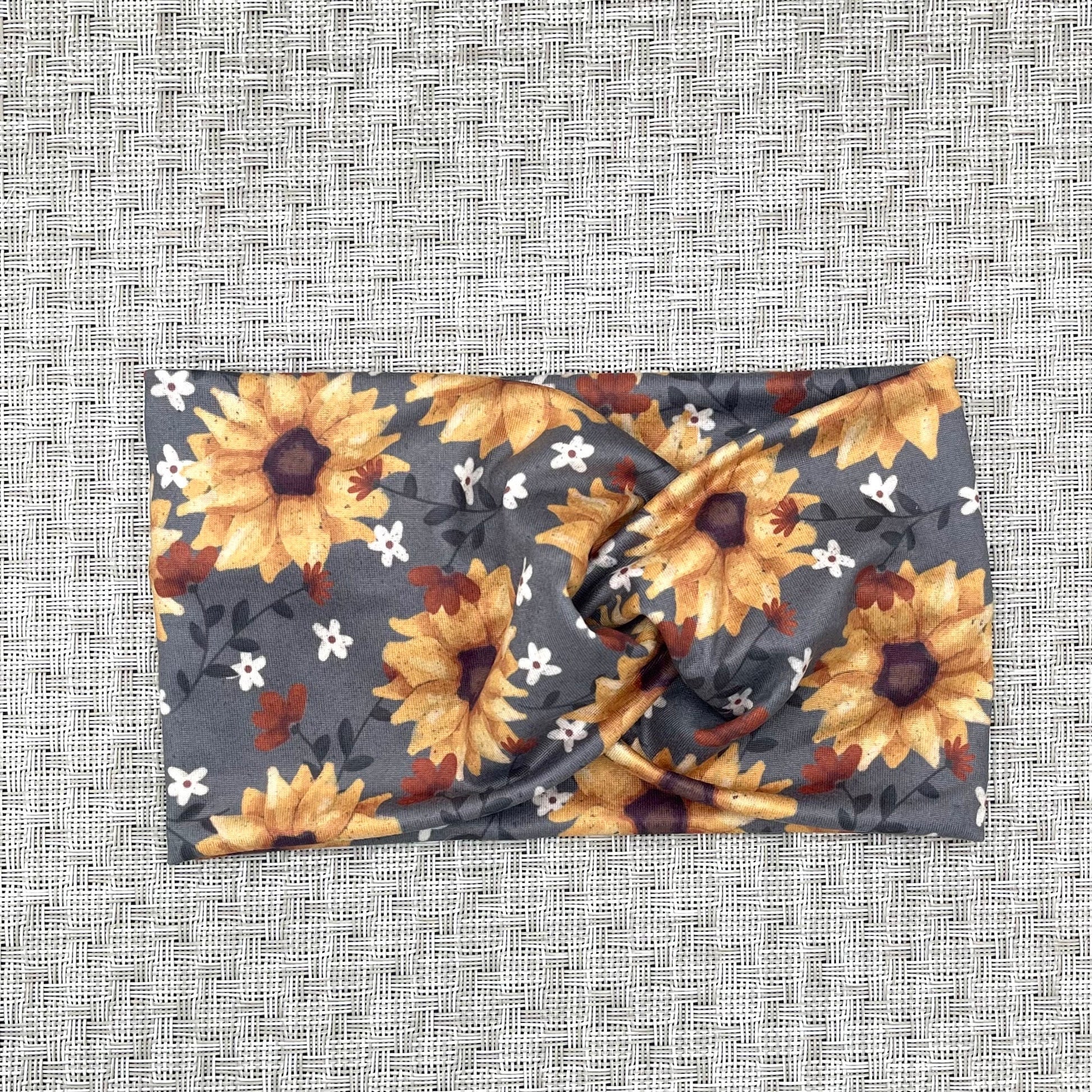 gray headband with sunflowers