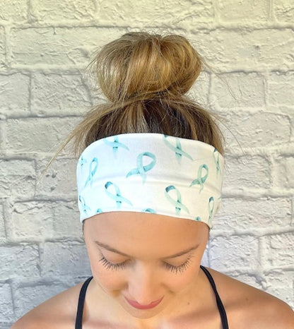 white headband with teal awareness ribbons