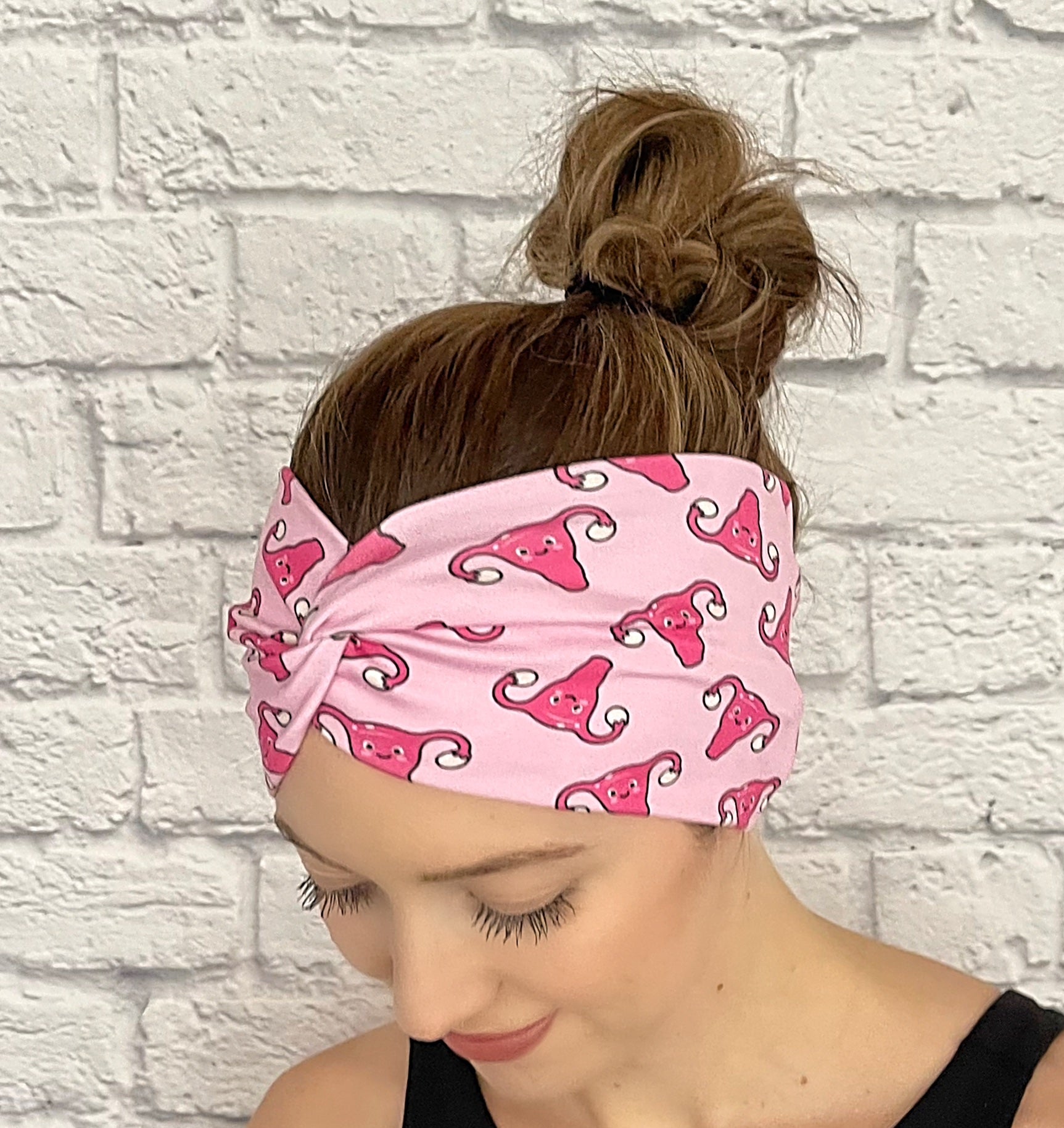 pink headband with uterus and ovaries